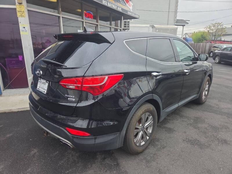 hyundai santa fe 2016 5XYZTDLB3GG331467 image hyundai santa fe 2016 5XYZTDLB3GG331467 image